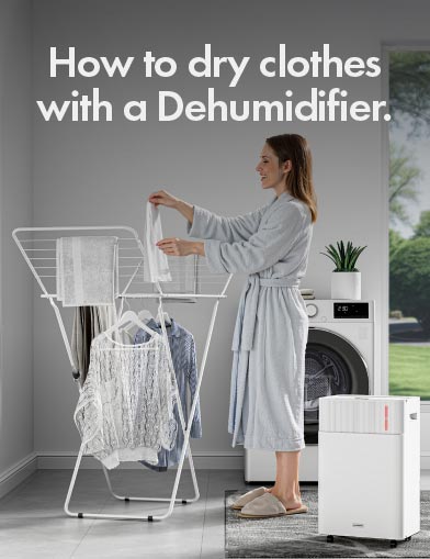 Woman Hanging Washed Clothing Near Vonhaus Dehumidifier